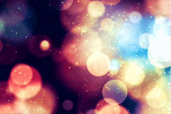 Luci di diversi colori viste attraverso un obiettivo fuori fuoco. Feng Shui e colori.